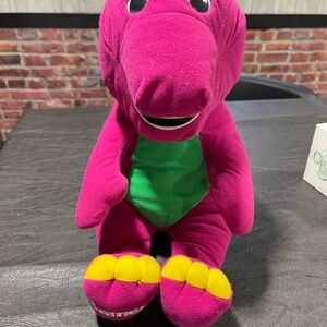 Talking Barney the purple Dinosaur Plush Toy.  He still talks